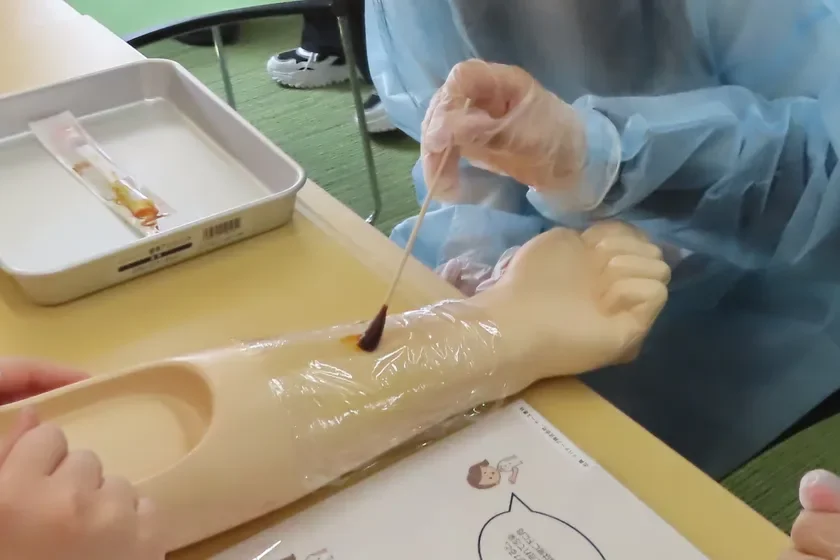 消毒体験の様子